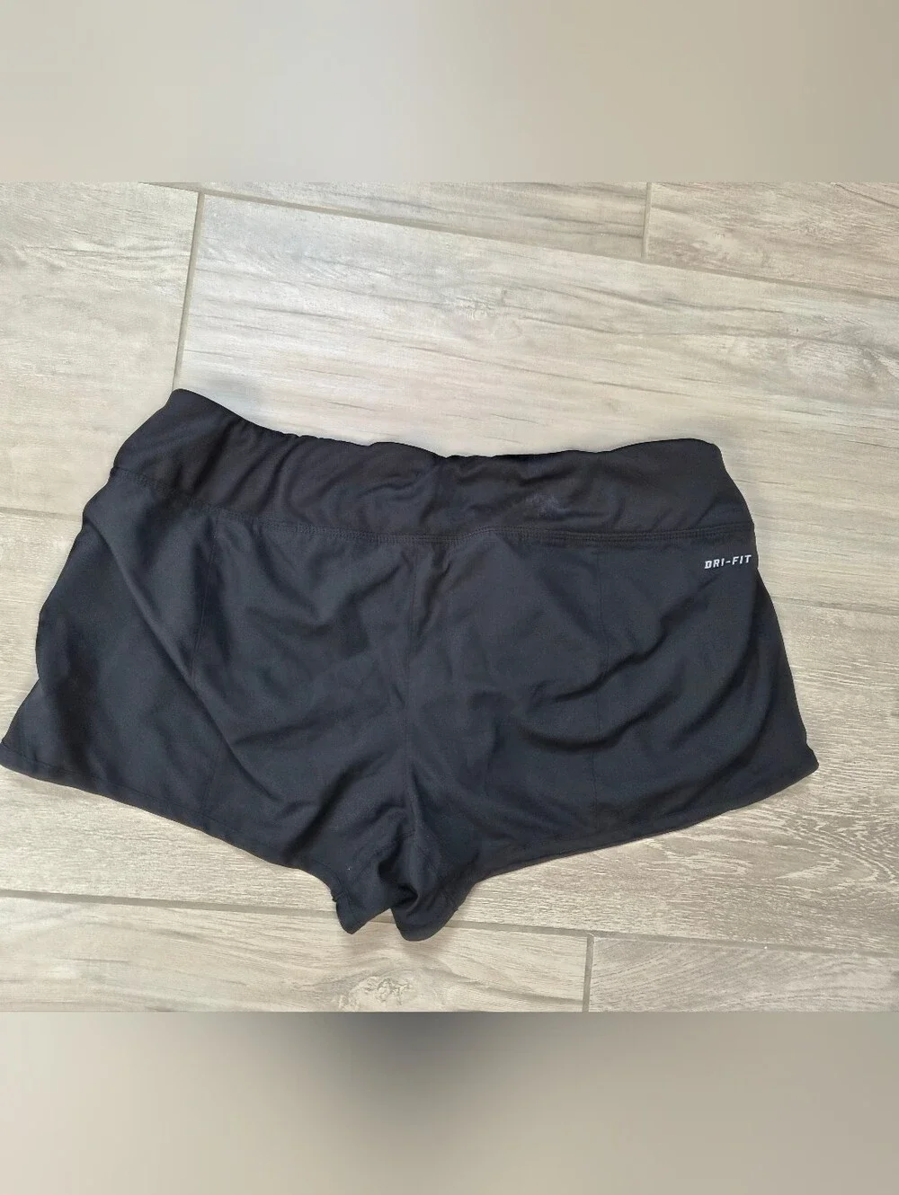 Nike Black Athletic Shorts with Yellow Accents and Steelers Patch